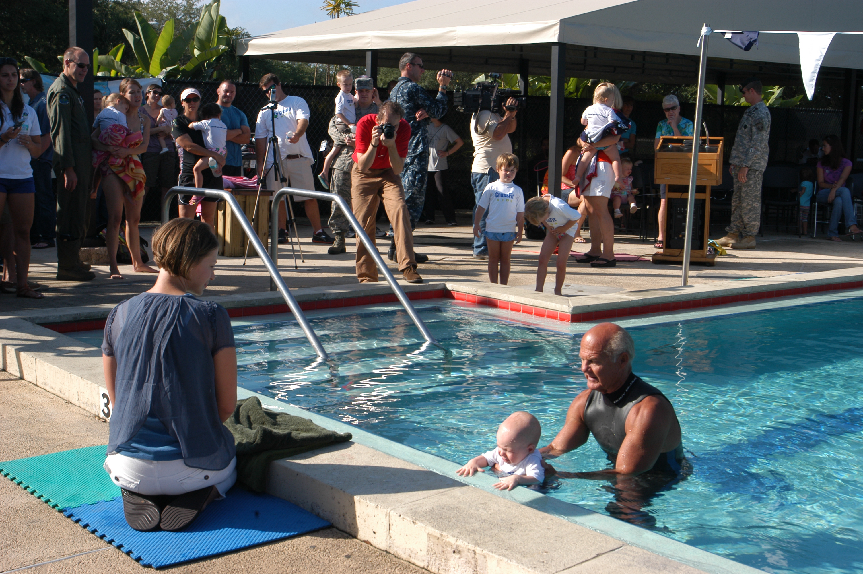 Parent Ava Gerdeman watches as her son Ryann perfoms skills learned in his ISR Self-Rescue lessons with Dr. Havey Barnett, Founder of ISR. 